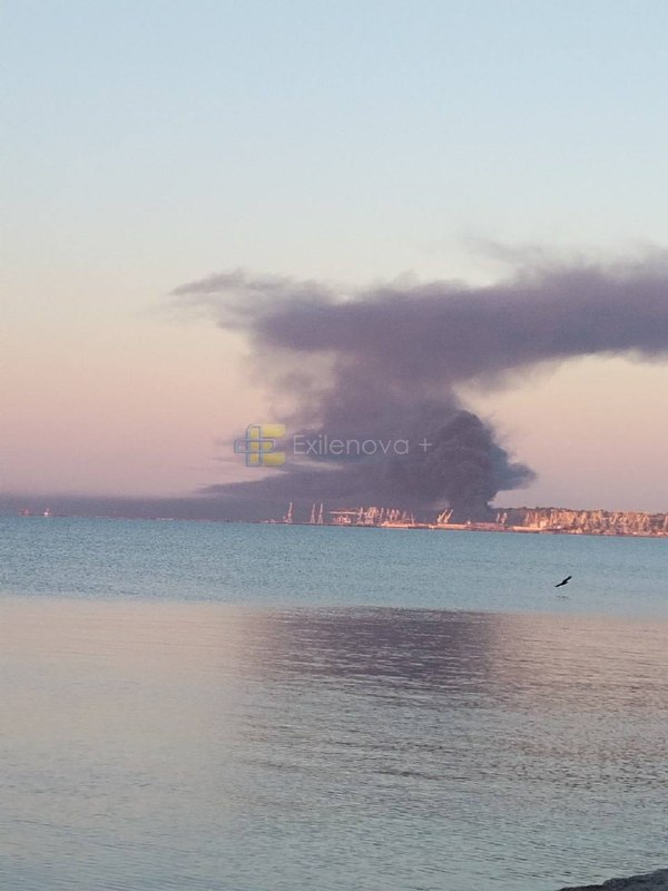 Smoke is rising over port in Mariupol