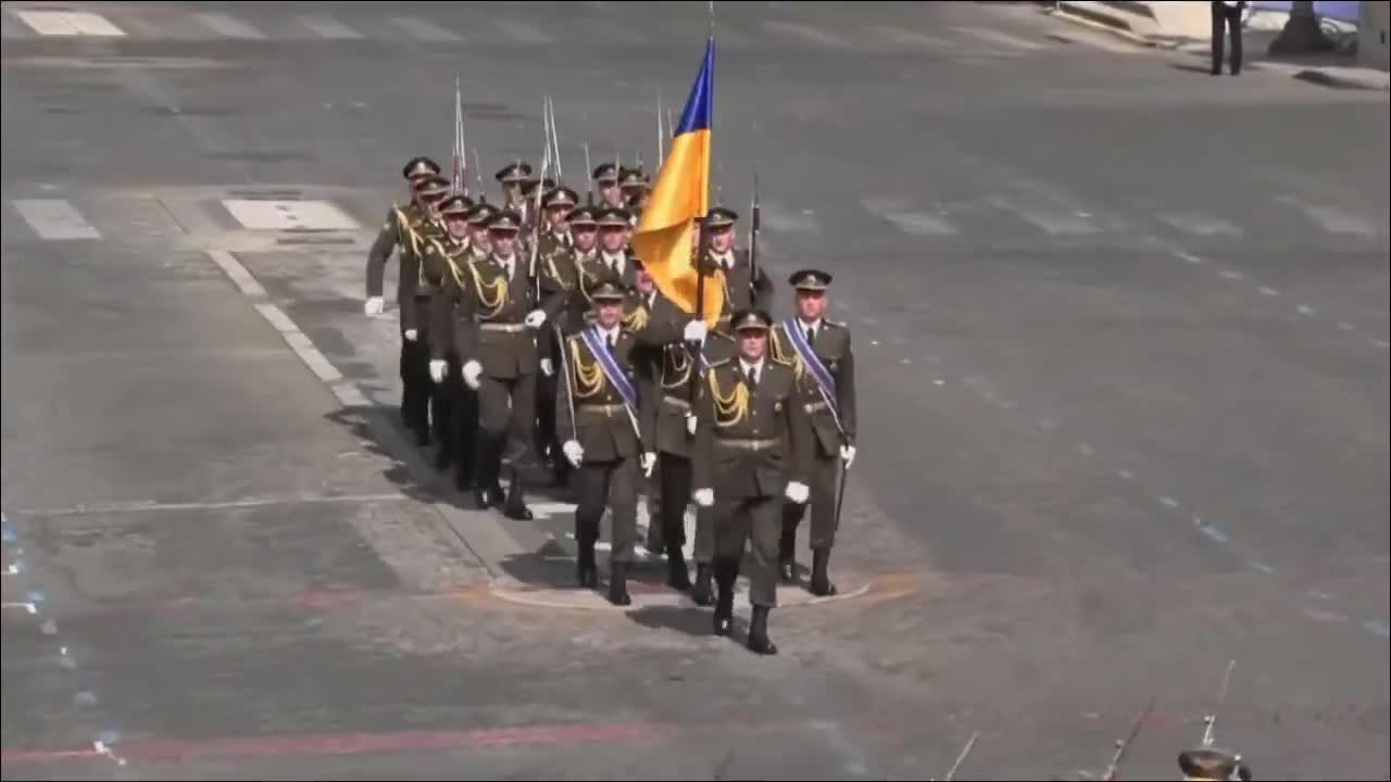 Ukrainian troops joined France's Bastille Day parade in Paris for the first time, while two Ukrainian pilots flew French-supplied Mirage fighter jets overhead